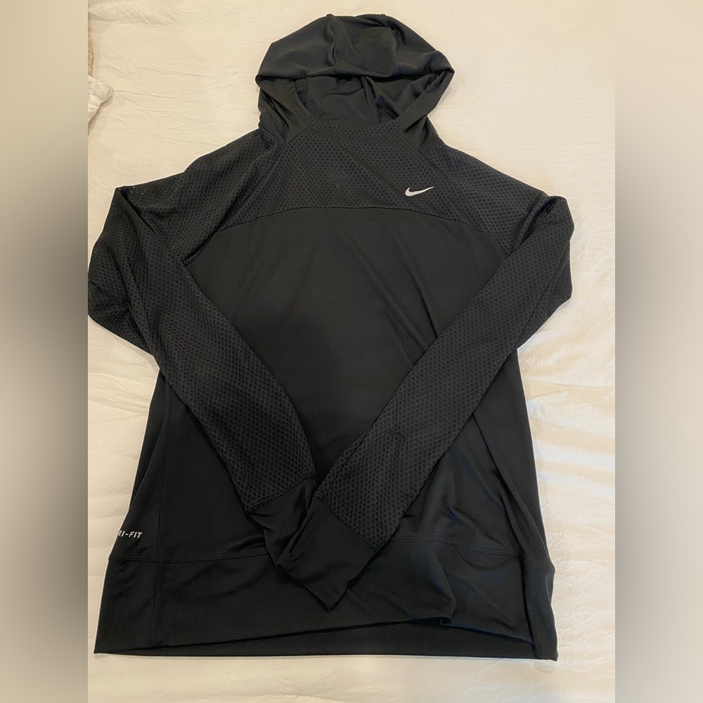 Nike dri fit pullover. Very thin material perfect for running or working out.
